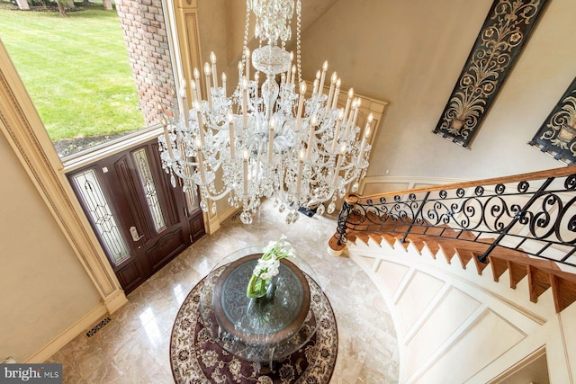 3500 Windy Bush Rd, New Hope, PA 18938 - entrance foyer featuring a towering ceiling, a chandelier, and stairs