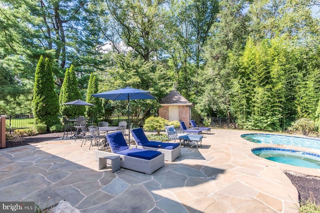 3500 Windy Bush Rd, New Hope, PA 18938 - view of patio with an in-ground hot tub and an outdoor structure