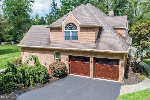 3500 Windy Bush Rd, New Hope, PA 18938 - view of front facade featuring driveway, brick siding, and roof with shingles