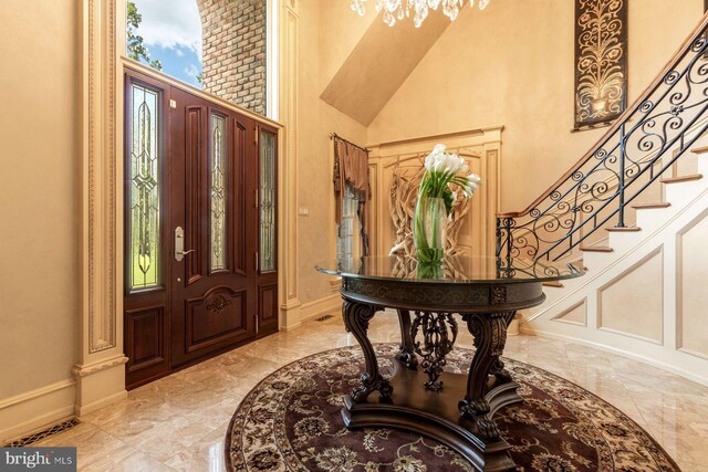 3500 Windy Bush Rd, New Hope, PA 18938 - entrance foyer featuring a high ceiling, stairs, and light marble finish floors