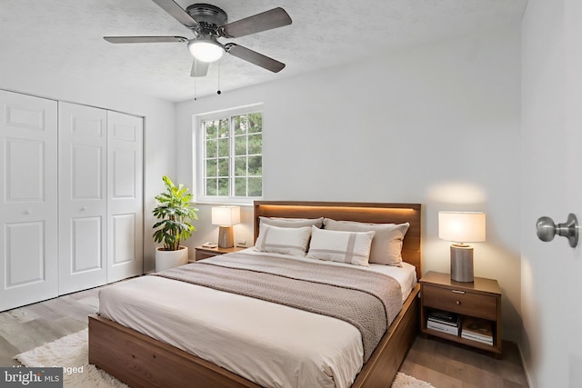 8456 Rocky Knob Ct, Lorton, VA 22079 - bedroom with wood finished floors, a closet, and ceiling fan