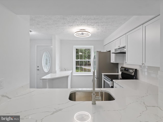 8456 Rocky Knob Ct, Lorton, VA 22079 - kitchen featuring under cabinet range hood, stainless steel electric stove, a textured ceiling, light stone counters, and white cabinets