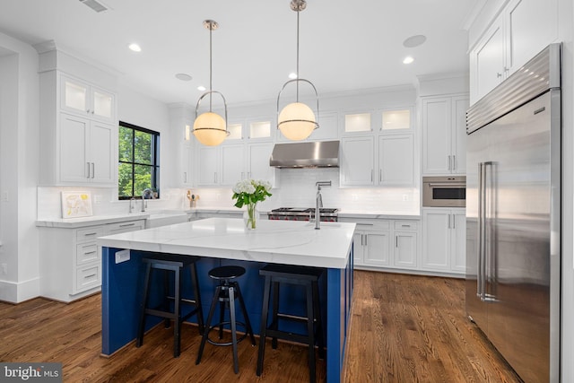 3433 N Edison St, Arlington, VA 22207 - kitchen with stainless steel built in fridge, ventilation hood, a kitchen island with sink, white cabinetry, and recessed lighting