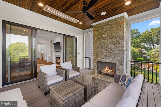 3433 N Edison St, Arlington, VA 22207 - wooden deck with an outdoor living space with a fireplace and a ceiling fan