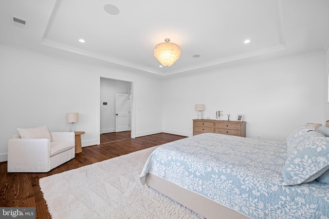3433 N Edison St, Arlington, VA 22207 - bedroom with wood finished floors, a tray ceiling, and ornamental molding
