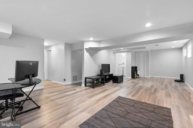 7012 Nashville Ct, Lanham, MD 20706 - living room with light wood-type flooring, recessed lighting, and a desk