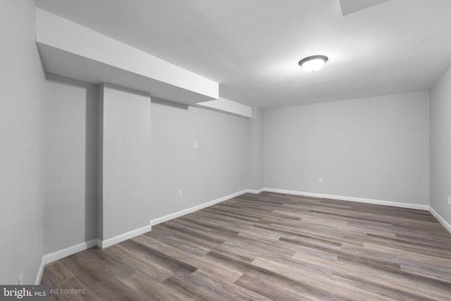 7012 Nashville Ct, Lanham, MD 20706 - finished basement featuring wood finished floors and baseboards