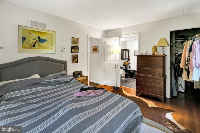 23 Le Forge Ct Unit 23, Chesterbrook, PA 19087 - bedroom featuring wood finished floors, a walk in closet, and a closet