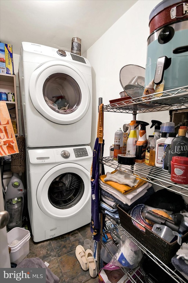 23 Le Forge Ct Unit 23, Chesterbrook, PA 19087 - washroom with stacked washer and clothes dryer and stone finish flooring