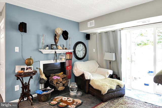 23 Le Forge Ct Unit 23, Chesterbrook, PA 19087 - living area with tile patterned flooring and a textured ceiling