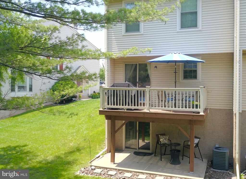 1263 Maple Glen Cir, Pottstown, PA 19464 - back of house featuring a lawn, a patio, and a wooden deck