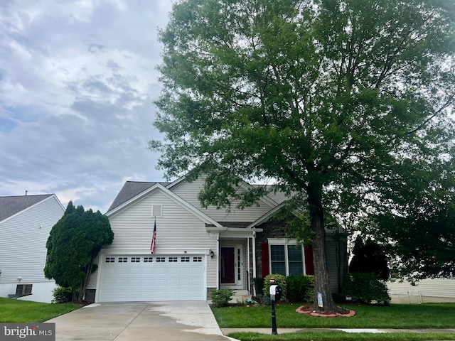 7 Covington Dr, Fredericksburg, VA 22406 - traditional-style house with concrete driveway and a front lawn