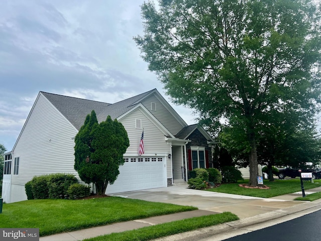 7 Covington Dr, Fredericksburg, VA 22406 - view of front of home with driveway, a front yard, a garage, and roof with shingles