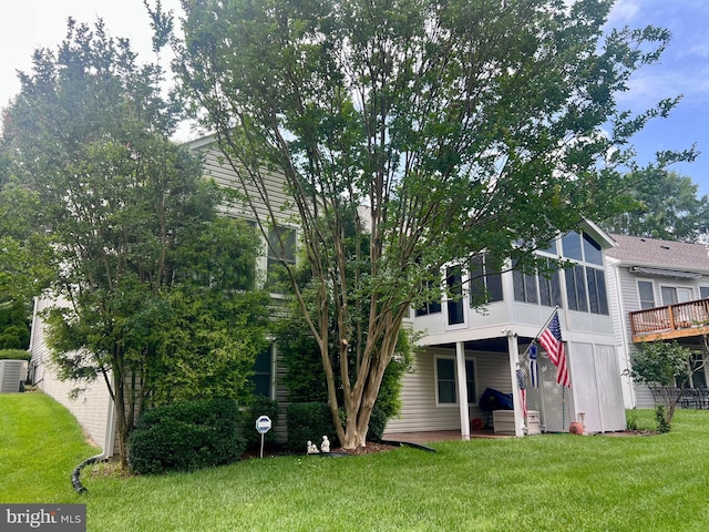 7 Covington Dr, Fredericksburg, VA 22406 - rear view of house with a sunroom and a yard