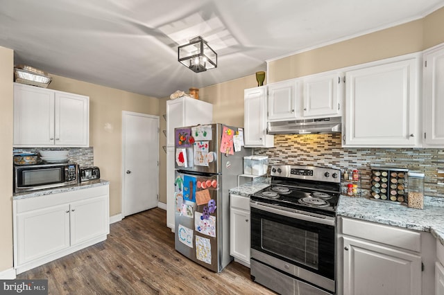 246 Le Carra Dr, Lansdowne, PA 19050 - kitchen featuring appliances with stainless steel finishes, extractor fan, white cabinetry, and decorative backsplash