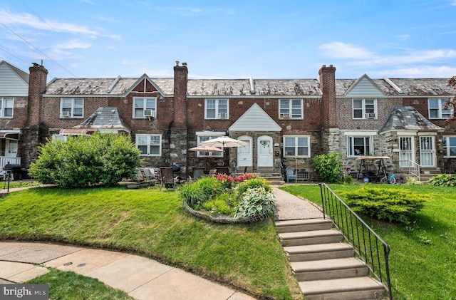 246 Le Carra Dr, Lansdowne, PA 19050 - townhome / multi-family property featuring a high end roof, a chimney, and a front lawn