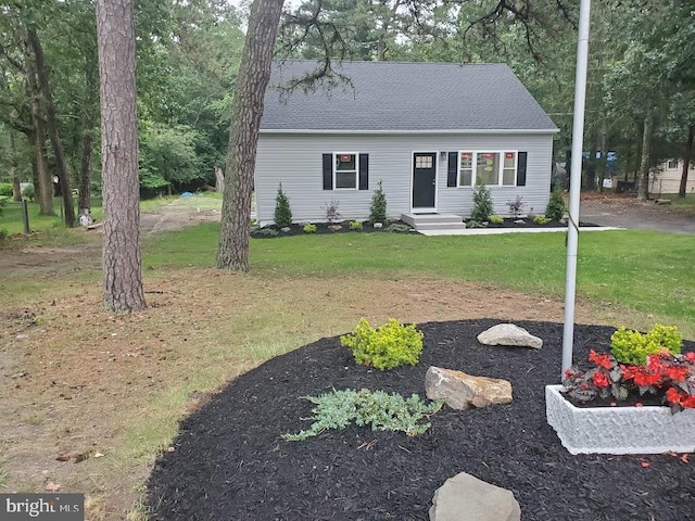 258 Ridge Rd, Browns Mills, NJ 08015 - new england style home with a front yard and roof with shingles