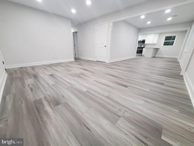 258 Ridge Rd, Browns Mills, NJ 08015 - unfurnished living room featuring light wood-type flooring and recessed lighting