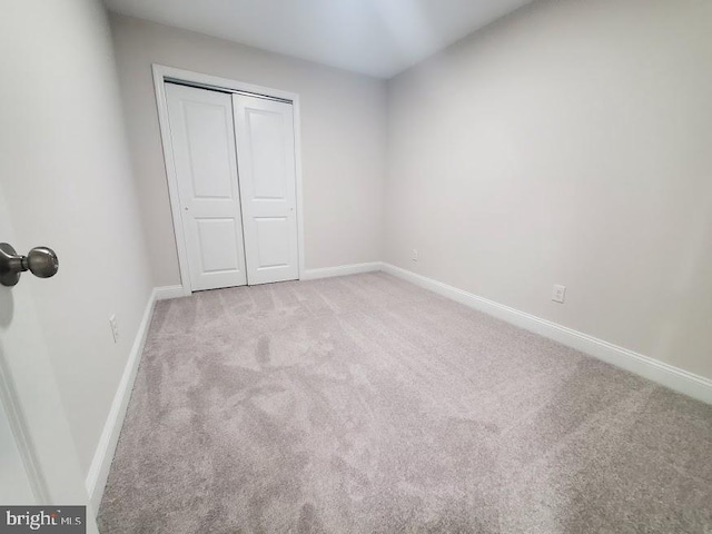 258 Ridge Rd, Browns Mills, NJ 08015 - unfurnished bedroom featuring carpet flooring and a closet