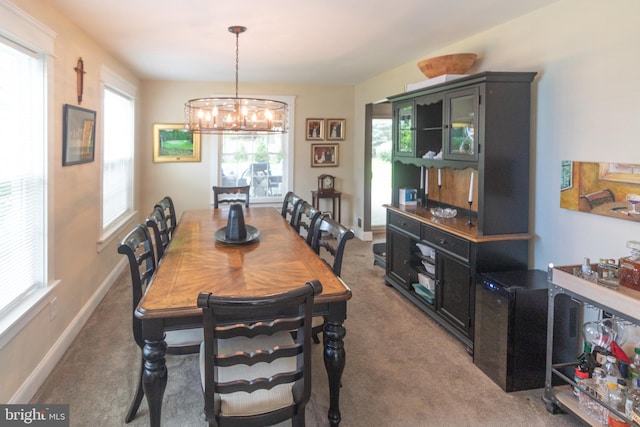 47 Sherwood Ln, Westampton, NJ 08060 - carpeted dining room with a chandelier and baseboards