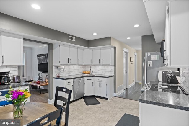 47 Sherwood Ln, Westampton, NJ 08060 - kitchen featuring stainless steel appliances, tasteful backsplash, white cabinets, and recessed lighting