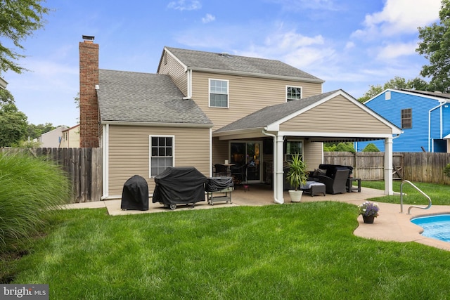 47 Sherwood Ln, Westampton, NJ 08060 - rear view of property featuring a fenced backyard, a patio, a chimney, and outdoor lounge area