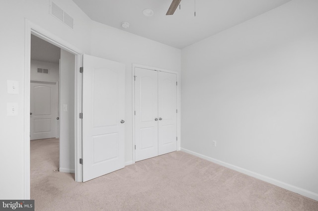 1025 Overlook Way, Laurel, MD 20707 - unfurnished bedroom featuring light colored carpet, a closet, and a ceiling fan