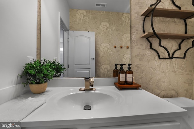 1025 Overlook Way, Laurel, MD 20707 - bathroom featuring wallpapered walls and vanity