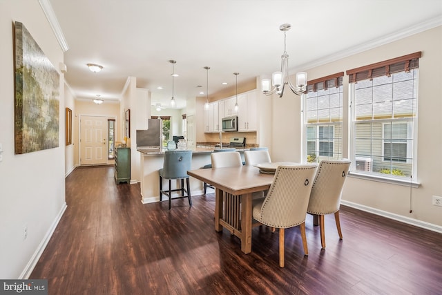 16916 Four Seasons Dr, Dumfries, VA 22025 - dining room featuring dark wood-style flooring, ornamental molding, a chandelier, plenty of natural light, and recessed lighting