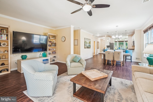 16916 Four Seasons Dr, Dumfries, VA 22025 - living room with a chandelier, wood finished floors, a ceiling fan, ornamental molding, and built in shelves