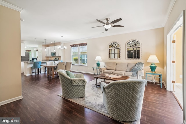 16916 Four Seasons Dr, Dumfries, VA 22025 - living room with ornamental molding, a ceiling fan, dark wood-style flooring, and a chandelier
