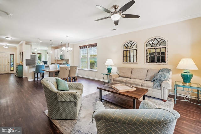 16916 Four Seasons Dr, Dumfries, VA 22025 - living room featuring crown molding, ceiling fan, and dark wood-type flooring