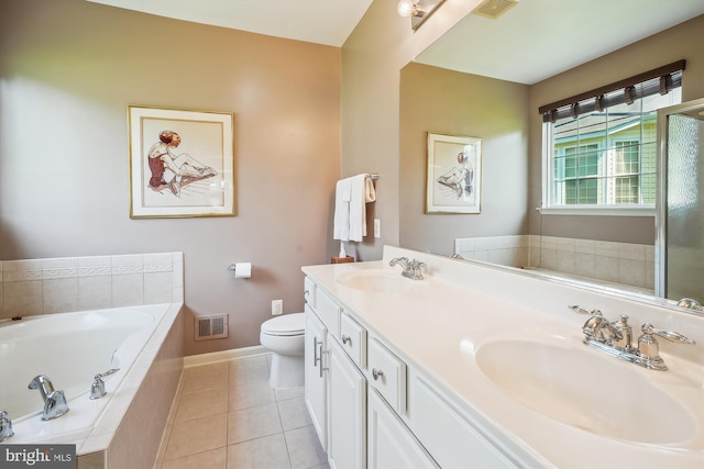 16916 Four Seasons Dr, Dumfries, VA 22025 - full bath with double vanity, a garden tub, and tile patterned floors