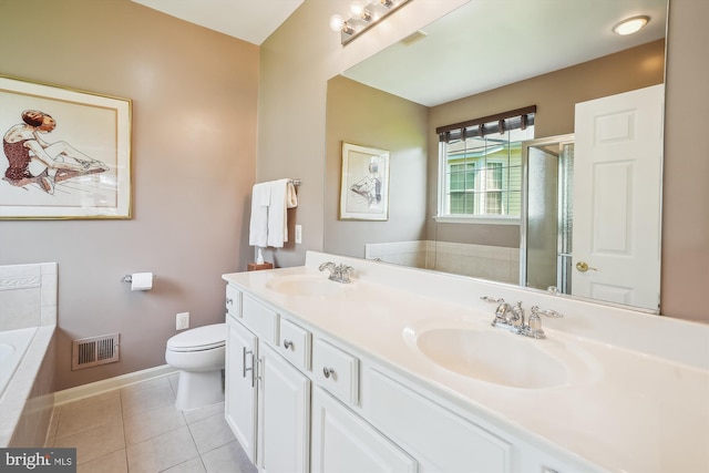 16916 Four Seasons Dr, Dumfries, VA 22025 - bathroom with double vanity, a bath, a shower with shower door, and tile patterned floors