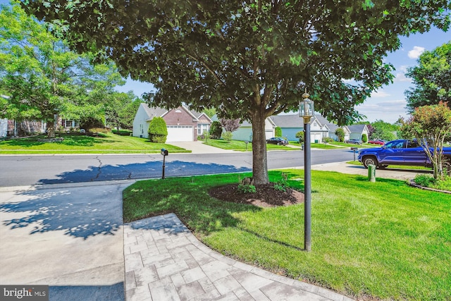 16916 Four Seasons Dr, Dumfries, VA 22025 - view of grassy yard with a residential view