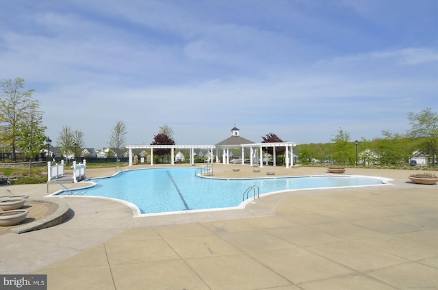 16916 Four Seasons Dr, Dumfries, VA 22025 - community pool featuring a patio and a pergola