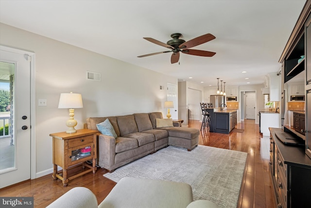 5790 Cedar Glen Dr, Narvon, PA 17555 - living area featuring a ceiling fan, wood finished floors, and recessed lighting