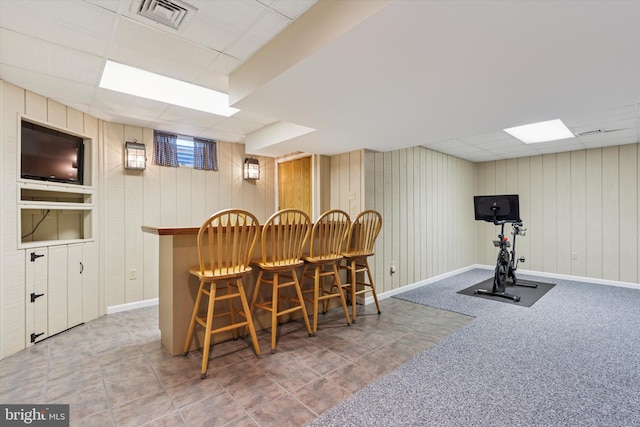 5790 Cedar Glen Dr, Narvon, PA 17555 - dining room with a drop ceiling, a dry bar, and wooden walls