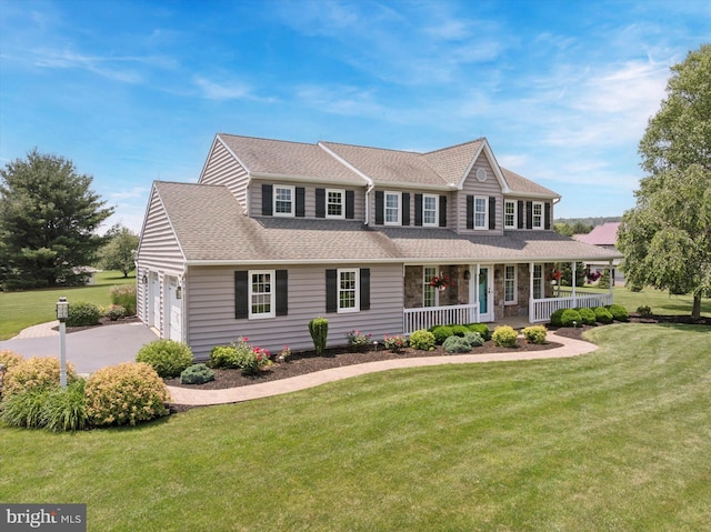 5790 Cedar Glen Dr, Narvon, PA 17555 - colonial home featuring covered porch, driveway, a front lawn, and a shingled roof