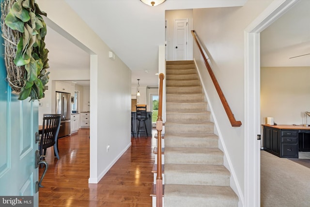 5790 Cedar Glen Dr, Narvon, PA 17555 - staircase with wood finished floors and baseboards