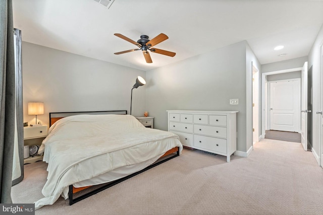 6908 Fairfax Dr Unit 202, Arlington, VA 22213 - bedroom with light colored carpet and a ceiling fan
