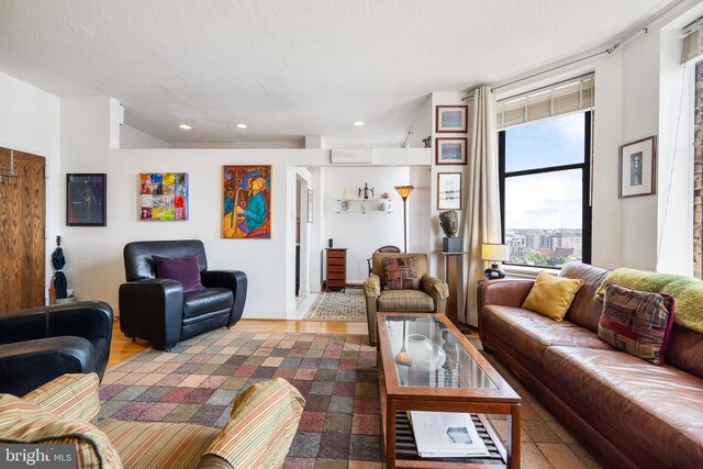 1615 Q St NW Unit 1001, Washington, DC 20009 - living room with recessed lighting and wood finished floors
