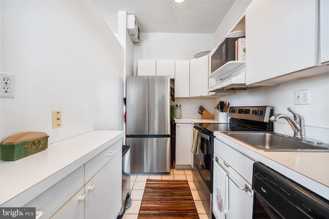 1615 Q St NW Unit 1001, Washington, DC 20009 - kitchen featuring appliances with stainless steel finishes, extractor fan, light countertops, white cabinetry, and light tile patterned flooring
