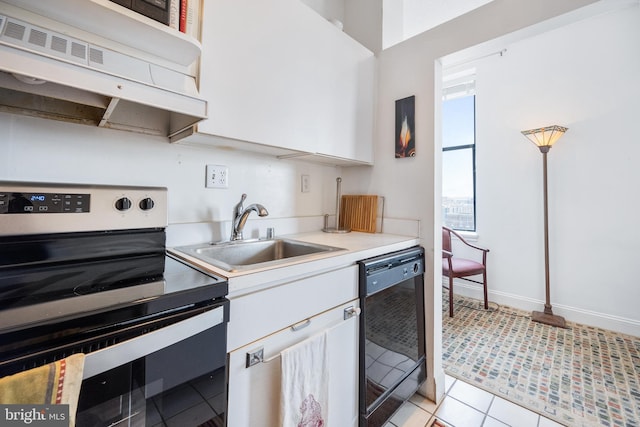1615 Q St NW Unit 1001, Washington, DC 20009 - kitchen with electric range, dishwasher, under cabinet range hood, white cabinets, and light countertops