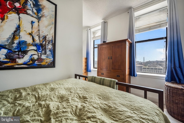 1615 Q St NW Unit 1001, Washington, DC 20009 - bedroom with a textured ceiling