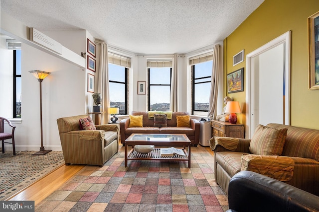 1615 Q St NW Unit 1001, Washington, DC 20009 - living area with plenty of natural light and a textured ceiling