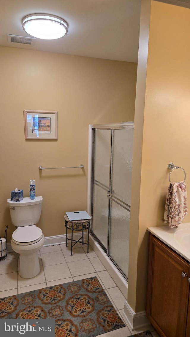1000 Fountainview Cir Unit 1406, Newark, DE 19713 - bathroom with a shower stall, vanity, and tile patterned flooring