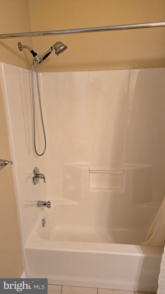 1000 Fountainview Cir Unit 1406, Newark, DE 19713 - bathroom featuring tile patterned floors and shower / bath combo with shower curtain