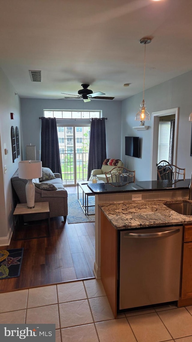 1000 Fountainview Cir Unit 1406, Newark, DE 19713 - kitchen with dishwasher, open floor plan, pendant lighting, light wood finished floors, and ceiling fan