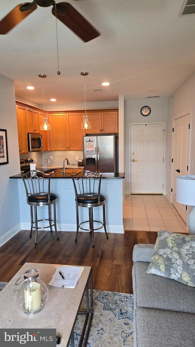 1000 Fountainview Cir Unit 1406, Newark, DE 19713 - living room featuring wood finished floors, recessed lighting, and ceiling fan
